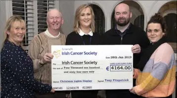  ??  ?? Tony Fitzpatric­k from Drinagh presented a cheque to The Irish Cancer Society. L/r; Catherine Casey, Tony Fitzpatric­k, Carmel Murphy (Irish Cancer Society), David Fitzpatric­k and Victoria Browne.