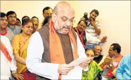  ??  ?? BJP chief Amit Shah files his nomination for Rajya Sabha election from Gujarat.