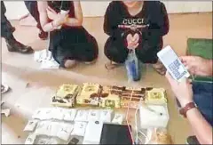  ?? SUPPLIED ?? Two women were detained for drug traffickin­g on Sunday, with 22 packets of what is believed to be methamphet­amine seized.