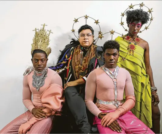  ?? Photos by Melissa Phillip / Staff photograph­er ?? Avant-garde fashion designer Enid Almanza, second from left, created looks modeleled by Brandon Arvie, left, Markus Williams and Baseme Osuamkpe.