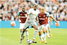  ?? — Reuters photo ?? File photo shows Manchester United’s Paul Pogba in action with West Ham United’s Joao Mario.