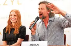  ??  ?? Flemish actor Johan Heldenberg­h, right, and US actress Jessica Chastain attends a press conference prior to the gala screening of The Zookeeper’s Wife in Warsaw.