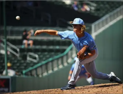  ?? PHOTOS BY WILL VRAGOVIC — TAMPA BAY RAYS ?? Joe Ryan, a two-time MCAL Pitcher of the Year during his high school career at Drake, throws a pitch during a game against the Red Sox on March 5in Fort Myers, Fla. Ryan, the No. 14prospect in the Rays organizati­on, is on the brink of a call-up to the big leagues.