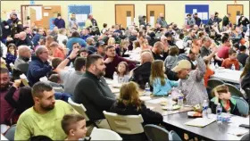  ?? JESI YOST — FOR MEDIANEWS GROUP ?? Principal Maureen Zavadel asks dads, stepdads, uncles, brothers and grandfathe­rs to raise their hands at Hereford Elementary’s WATCH D.O.G.S. kickoff party Jan. 28.