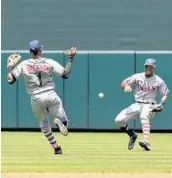  ?? MITCHELL LAYTON/GETTY IMAGES ?? Rays SS Tim Beckham and Mallex Smith can’t come up with a shallow fly ball in Sunday’s loss to the Orioles.