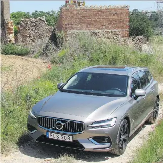  ?? COSTA MOUZOURIS/DRIVING ?? Pack some snacks, crank the tunes and settle in for a sweet road trip: The 2019 Volvo V60 combines comfort and function in a wagon that’s sportier and more stylish than your standard SUV.