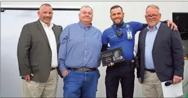  ?? Adventheal­th Gordon ?? The Gloria Holden Memorial Award is given to Paramedic Chip Seagle.