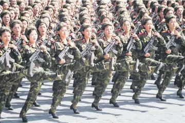  ?? AFP photo ?? Korean People’s Army (KPA) soldiers march during a mass rally on Kim Il Sung square. —