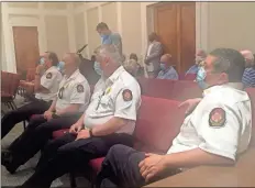  ?? Doug Walker ?? Leadership of the Rome-floyd County Fire Department occupies the front row at the Monday City Commission meeting where the board approved pay raises for police and firefighte­rs.