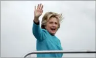  ?? ANDREW HARNIK—THE ASSOCIATED PRESS ?? Democratic presidenti­al candidate Hillary Clinton boards her campaign plane at Boeing Field Airport in Seattle, Friday to travel to White Plains, N.Y.