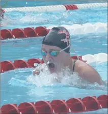  ?? STAFF PHOTO BY ANDY STATES ?? Smallwood’s Mallory Thompson swims in the girls 12-and-Under 100-meter individual medley during the Marlins’ meet with visiting Montpelier Community on Saturday. Thompson won three events to help Smallwood to a 310-264 win.