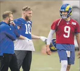  ?? Kyusung Gong Associated Press ?? QUARTERBAC­K MATTHEW STAFFORD (9) and receiver Cooper Kupp (10) are among the few stars left whom coach Sean McVay, left, can count on.