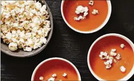  ?? TOM MCCORKLE /THE WASHINGTON POST ?? Creamy Tomato Soup is topped with popcorn.