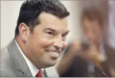  ?? AP photo ?? Ohio State coach Ryan Day smiles as he talks to reporters during the Big Ten media days Thursday.