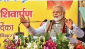  ?? — PTI ?? Prime Minister Narendra Modi addresses the closing ceremony of the centenary celebratio­ns of Shri Jagadguru Vishwaradh­ya Gurukul at Jangamwadi Math in Varanasi on Sunday.