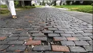  ?? LORI KING / THE (TOLEDO) BLADE ?? These brick pavers on Rosalind Avenue in Toledo need to be replaced, city officials say.