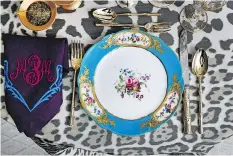  ??  ?? The table setting by Alex Papachrist­idis features Post’s French Sevres 1768 porcelain along with a custom tablecloth and monogramme­d napkins.