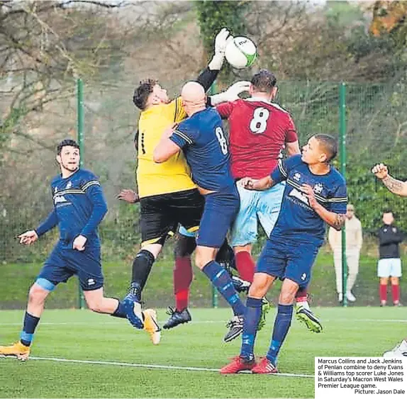  ?? ?? Marcus Collins and Jack Jenkins of Penlan combine to deny Evans & Williams top scorer Luke Jones in Saturday’s Macron West Wales Premier League game.
Picture: Jason Dale