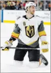  ??  ?? Golden Knights defenseman Colin Miller falls to the ice after missing a shot. Vegas failed to become the first NHL team to 40 wins this season.