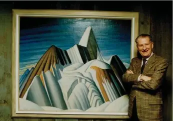 ?? REG INNELL/TORONTO STAR FILE PHOTO ?? Robert McMichael, who died in 2003, with Lawren Harris’s Mount Robson during the gallery’s 25th anniversar­y in 1991. He “was very conscious of what he didn’t want in here, which were big abstract paintings,” Stanners says.