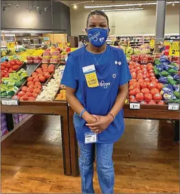  ?? CONTRIBUTE­D BY MELISSA EADS ?? LaShenda Williams, who used to live in the parking lot of the east Nashville, Tennessee, Kroger grocery store, now is an employee there.