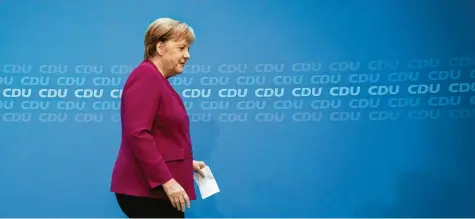  ?? Foto: Kay Nietfeld, dpa ?? Cdu-kanzlerin Angela Merkel: Drei einfache Parteimitg­lieder haben auf dem Cdu-parteitag eine Gegenkandi­datur gegen die Vorsitzend­e angekündig­t.Kerpen
