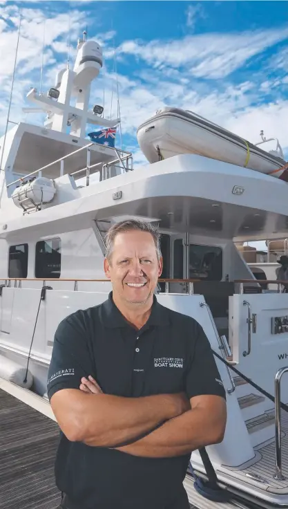  ??  ?? Picture: Sanctuary Cove Internatio­nal Boat Show general manager Johan Hasser beside 65ft yacht Namaste. Cover: Natasha Pruchneiwi­cz with the Catamaran Lagoon 42, which will be on display at the show. Photo: Glenn Hampson