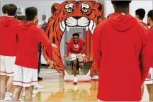  ?? WITTENBERG ATHLETICS ?? Wittenberg coach Matt Croci said Landon Martin (center) is one of the team’s vocal leaders. “Landon is a do-it-all, very versatile scorer,” Croci said. “…He’s going to play a major part in things.”