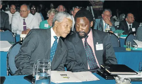  ?? Picture: AFP ?? GUIDING LIGHTS Cyril Ramaphosa, who was secretary-general of the ANC at the time, confers with Nelson Mandela at the multiparty talks on a new constituti­on for a democratic SA in January 1994. Ramaphosa played a leading role in the talks that led to...