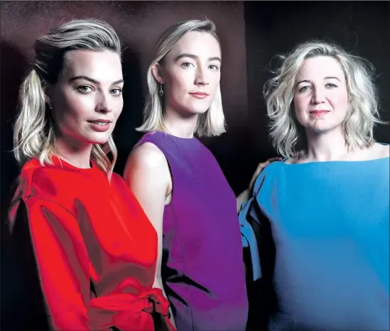  ?? Robert Gauthier Los Angeles Times ?? MARGOT ROBBIE, from left, plays a fearful Elizabeth while Saoirse Ronan is the titular willful royal in Josie Rourke’s film directing debut, “Mary Queen of Scots.”