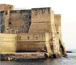  ??  ?? Legends says the Castel Dell’Ovo was built on top of an egg placed by the poet Virgil, who claimed the city would never fall as long as the egg was preserved.