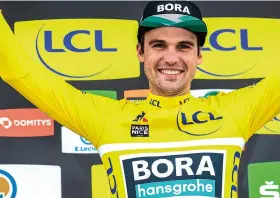  ??  ?? In yellow at Paris-Nice 2020, where Schachmann led from start to finish