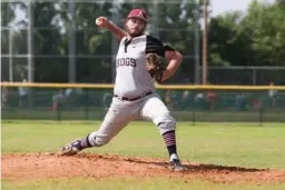  ?? Staff photo by Joshua Boucher ?? The Texarkana Razorbacks’ Justin Sivecker pitches to Arkansas Pulpwood on Saturday at Joe Blagg Field.