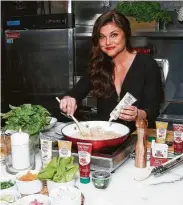  ?? Lars Niki / Getty Images ?? Tiffani Thiessen will host “Deliciousn­ess” on MTV.