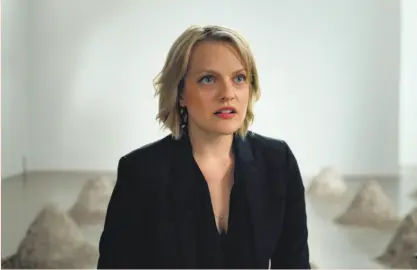  ?? Magnolia Pictures photos ?? Elisabeth Moss, above, was surprised when she got the role of a journalist in “The Square,” starring with Claes Bang, right.