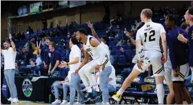  ?? JAM DAVID — UNC ATHLETICS ?? University of Northern Colorado graduate student Matt Johnson (2) celebrates after a teammate makes a shot during the Bears’ basketball game against Weber State on Monday, Feb. 6, 2023, at Bank of Colorado Arena. UNC dominated the Wildcats, 88-54.