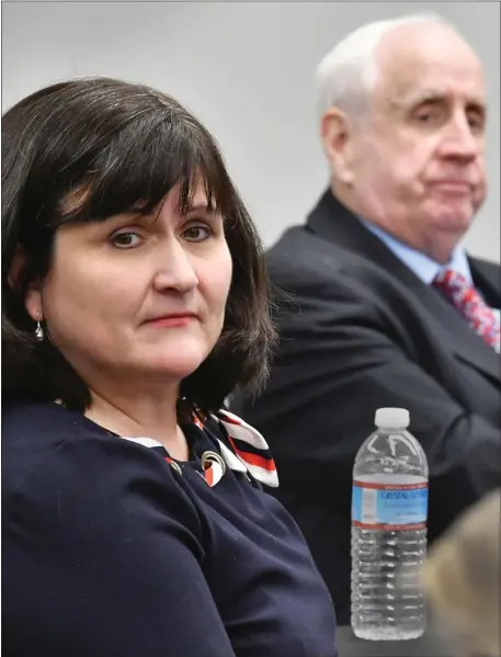  ?? CHRIS CHRISTO — BOSTON HERALD ?? MassGOP Chairwoman Amy Carnevale seated next to former Chair Jim Lyons, right, in January.