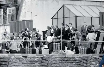  ?? Photo / Getty Images ?? The Beatles' final live performanc­e on January 30, 1969 in London, United Kingdom.