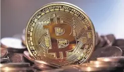  ?? ?? The robbery happened at student accommodat­ion in Parham Road, Canterbury, and bottom, Bitcoin currency