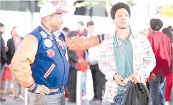  ?? Photos ?? Murphy (left) as Prince Akeem, and Fowler as Lavelle in ‘Coming 2 America.’