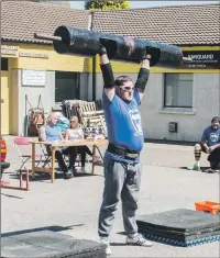  ?? Photo: Alba Photos ?? Local lad Calum Morrison is pictured lifting.