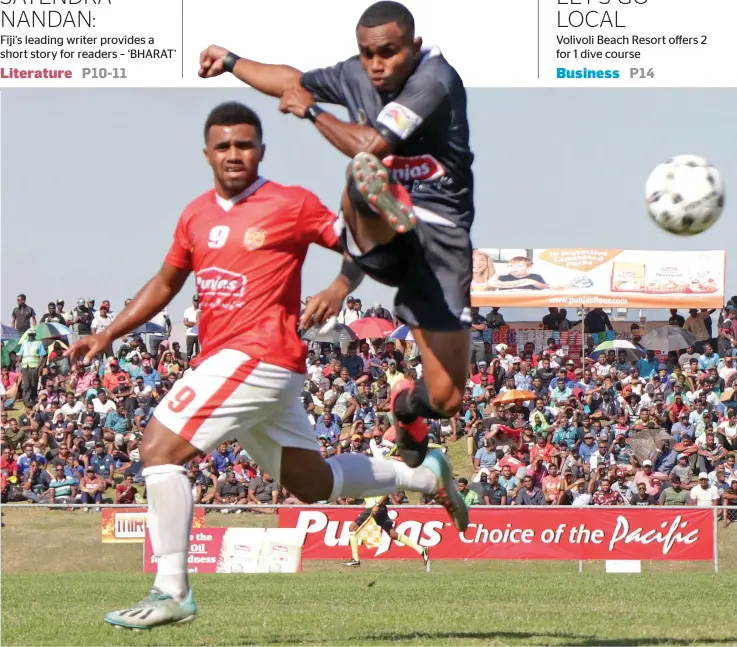  ?? Photo: Fiji FA Media ?? Delta One Automotive Repairs Rewa striker Setareki Hughes (left) against Priceline Pharmacy Ba during the Punjas Battle of the Giants semifinal at Churchill Park, Lautoka on August 15, 2020. The match ended at 2-2 but Rewa won 8-7 on a penalty shootout to play in today’s final.