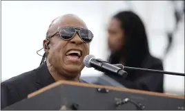  ??  ?? Musician Stevie Wonder performs at a campaign rally for Democratic presidenti­al candidate Hillary Clinton before President Barack Obama spoke to the audience in Kissimmee, Fla., in 2016.