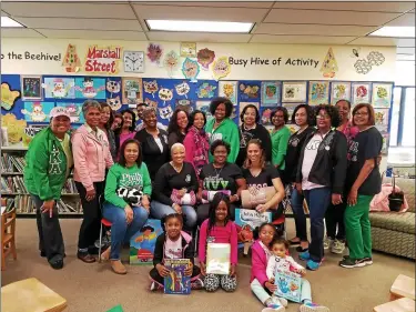  ?? SUBMITTED PHOTO ?? In this file photo from 2017, the members of Alpha Kappa Alpha Sorority, Inc.-Phi Beta Omega Chapter’s Family Strengthen­ing, committee are shown after its third annual “Blanket & Book” event at the Norristown Library. This signature program featured readings from a guest author, Ms. Monique Curry and librarian, Ms. Tiffany Joyner. As a result of the generous contributi­ons from members of the chapter, the Norristown NAACP and the Montgomery County Chapter of the Links, Inc., they were able to provide the following: 77blankets and 117books to families that attended the event 133books, 55in Spanish, to the library for distributi­on to children for the summer reading program 40blankets to the Norristown Salvation Army