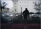  ?? GERALD HERBERT — THE ASSOCIATED PRESS ?? Floodwater­s move on the street in Pensacola, Fla., on Wednesday. The Census Bureau is contending with several natural disasters that are disrupting the final weeks of the nation’s once-a-decade headcount.