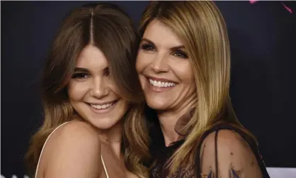  ??  ?? Lori Loughlin, right, poses with daughter Olivia Jade Giannulli. Photograph: Chris Pizzello/Invision/AP