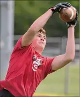  ??  ?? Guilderlan­d tight end Mitch Mackissock catches a pass at the high school on Aug. 4.