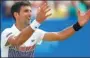  ?? MATTHEW CHILDS / REUTERS ?? Novak Djokovic celebrates winning the Eastbourne Internatio­nal final against Gael Monfils on Saturday.