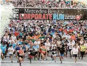  ?? CARL JUSTE cjuste@miamiheral­d.com ?? Nearly 27,000 participan­ts representi­ng 882 companies participat­ed in the 2019 Mercedes-Benz Corporate Run in Miami. This year’s event will be virtual.