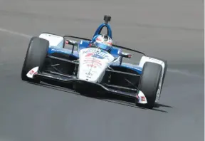  ?? AP PHOTO ?? Graham Rahal navigates the track during a practice session for the IndyCar Indianapol­is 500 at Indianapol­is Motor Speedway on Thursday.